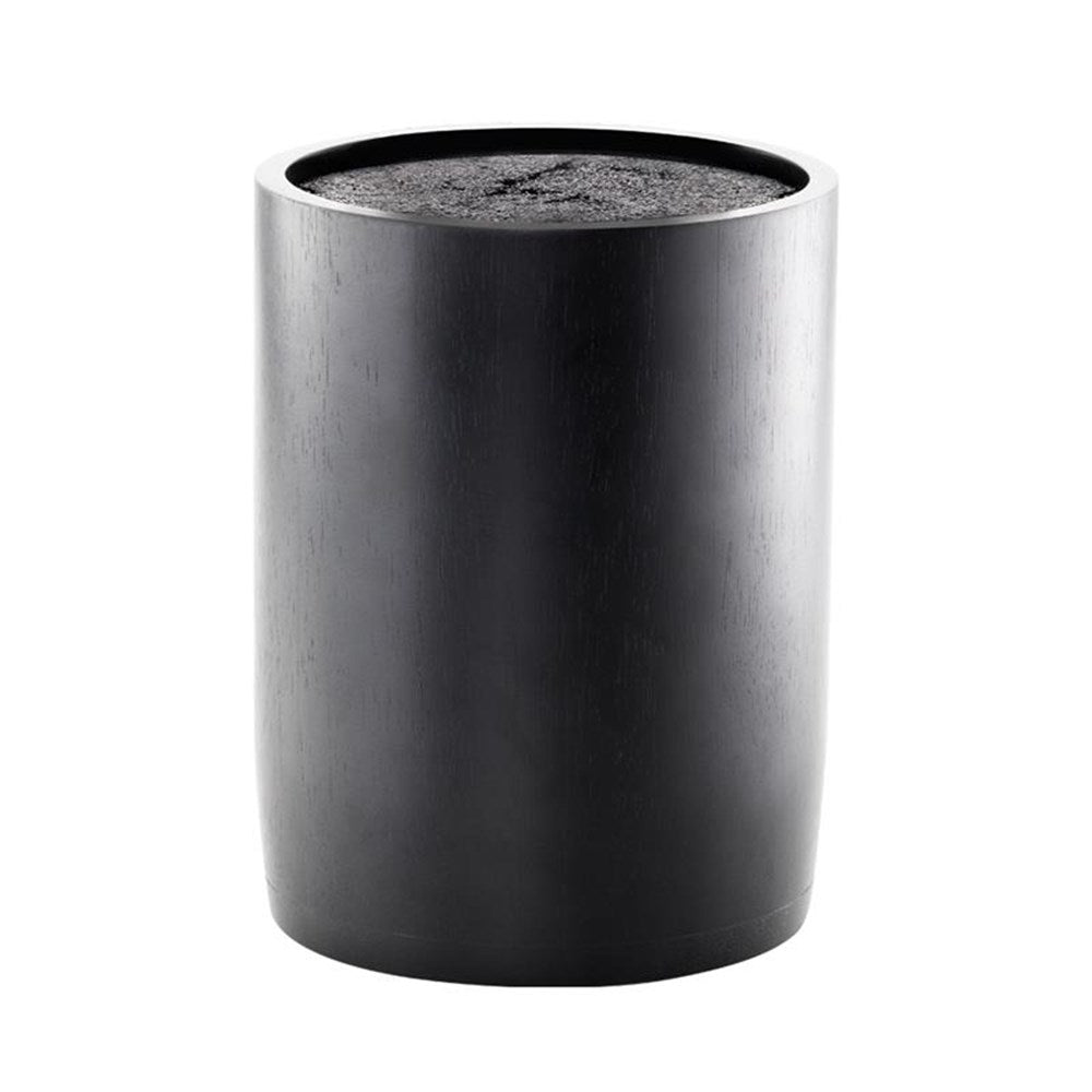 A collection of knives displayed in a sleek black block on a kitchen counter - Baccarat universal