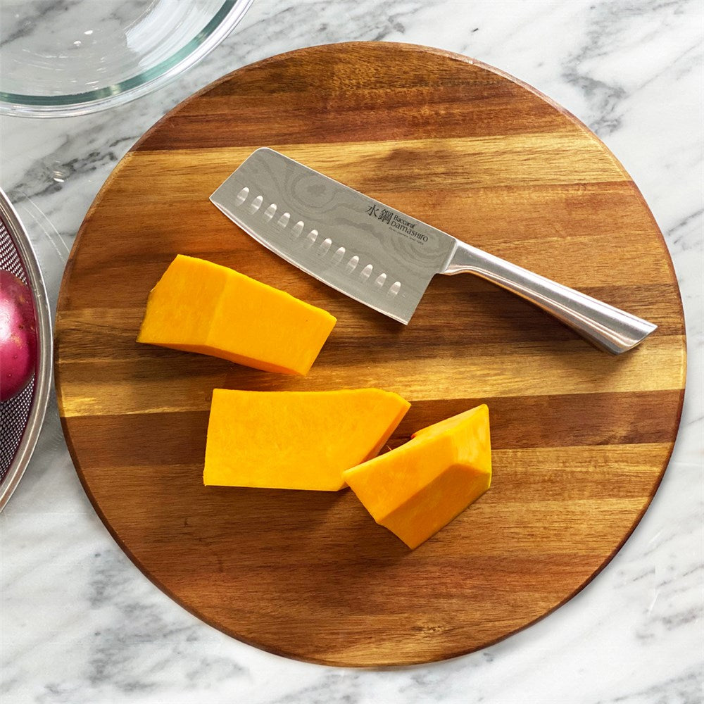 Elegant black chef's knife with a sharp blade and comfortable grip for effortless slicing - Sakai