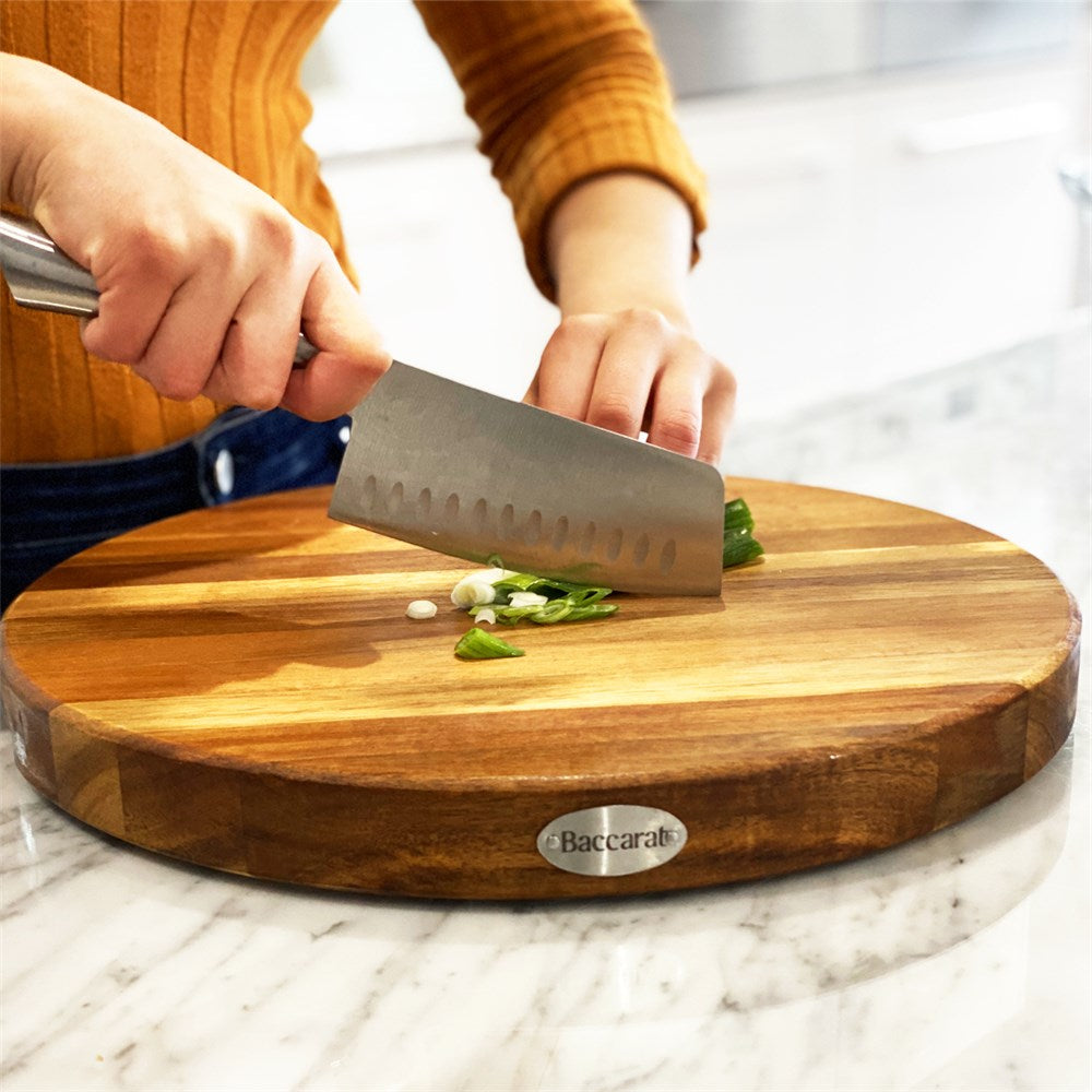 Elegant black chef's knife with a sharp blade and comfortable grip for effortless slicing - Sakai