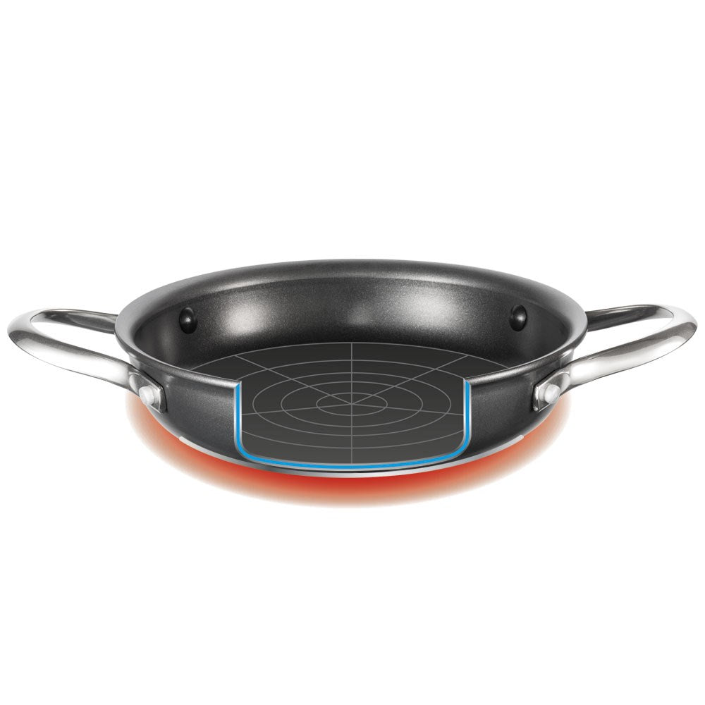 Aerial view of a frying pan filled with fresh green vegetables non-stick serving pan 24cm - Baccarat