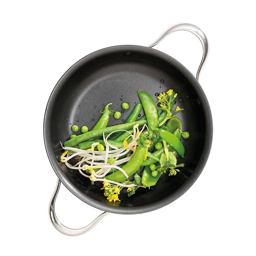 Three dishes on a wooden board with colourful cookware beef rolls noodle stir-fry dessert - Baccarat