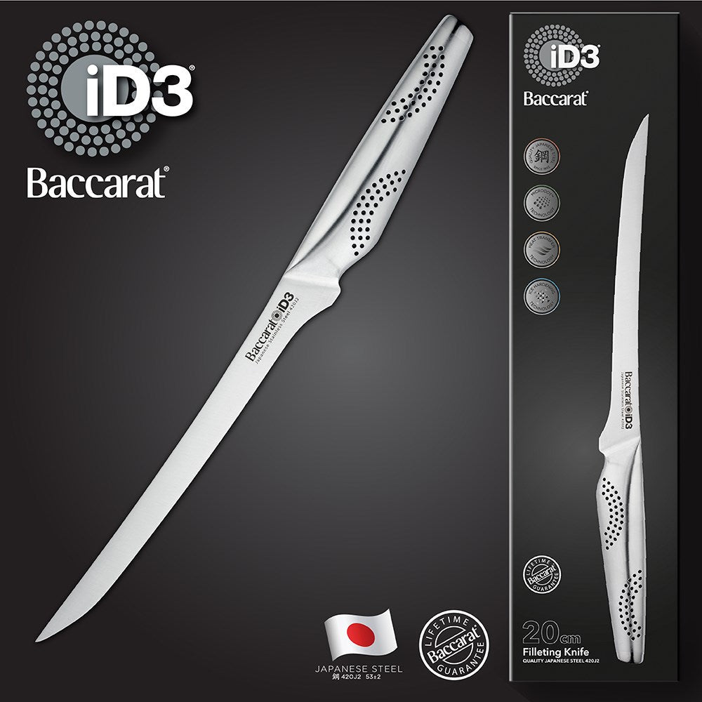 Sleek Baccarat Filleting Knife 20cm slicing salmon on a board with lemon slices and herbs