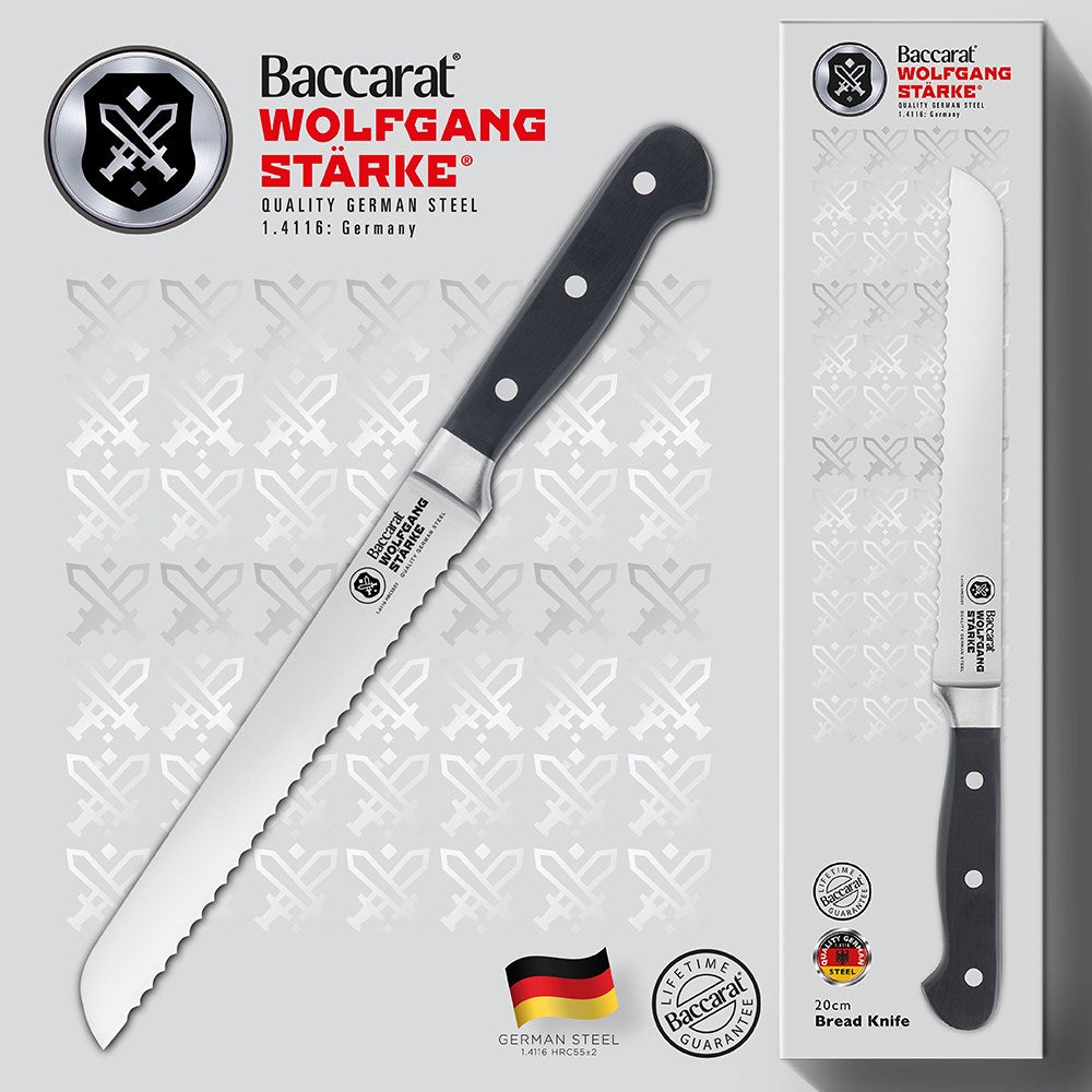 A serrated bread knife with a black ergonomic handle and silver blade ideal for slicing - Baccarat