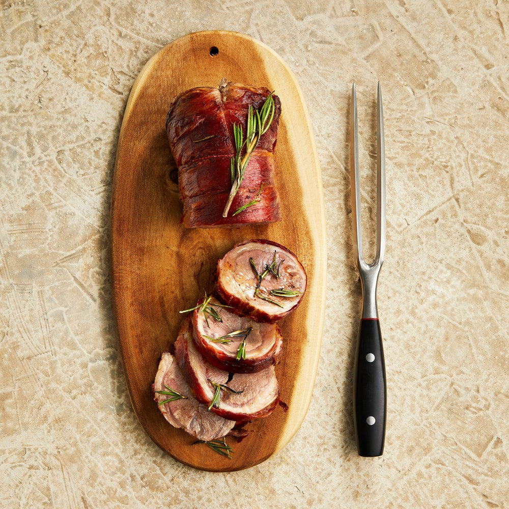 A variety of cleaver knives on wooden boards with fresh vegetables black handles - Baccarat iconix