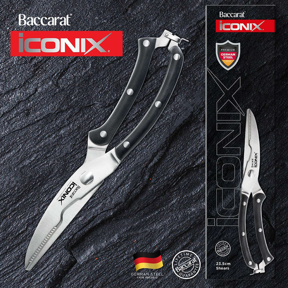 A pair of kitchen shears with black handles and stainless steel blades - Baccarat Iconix Shears