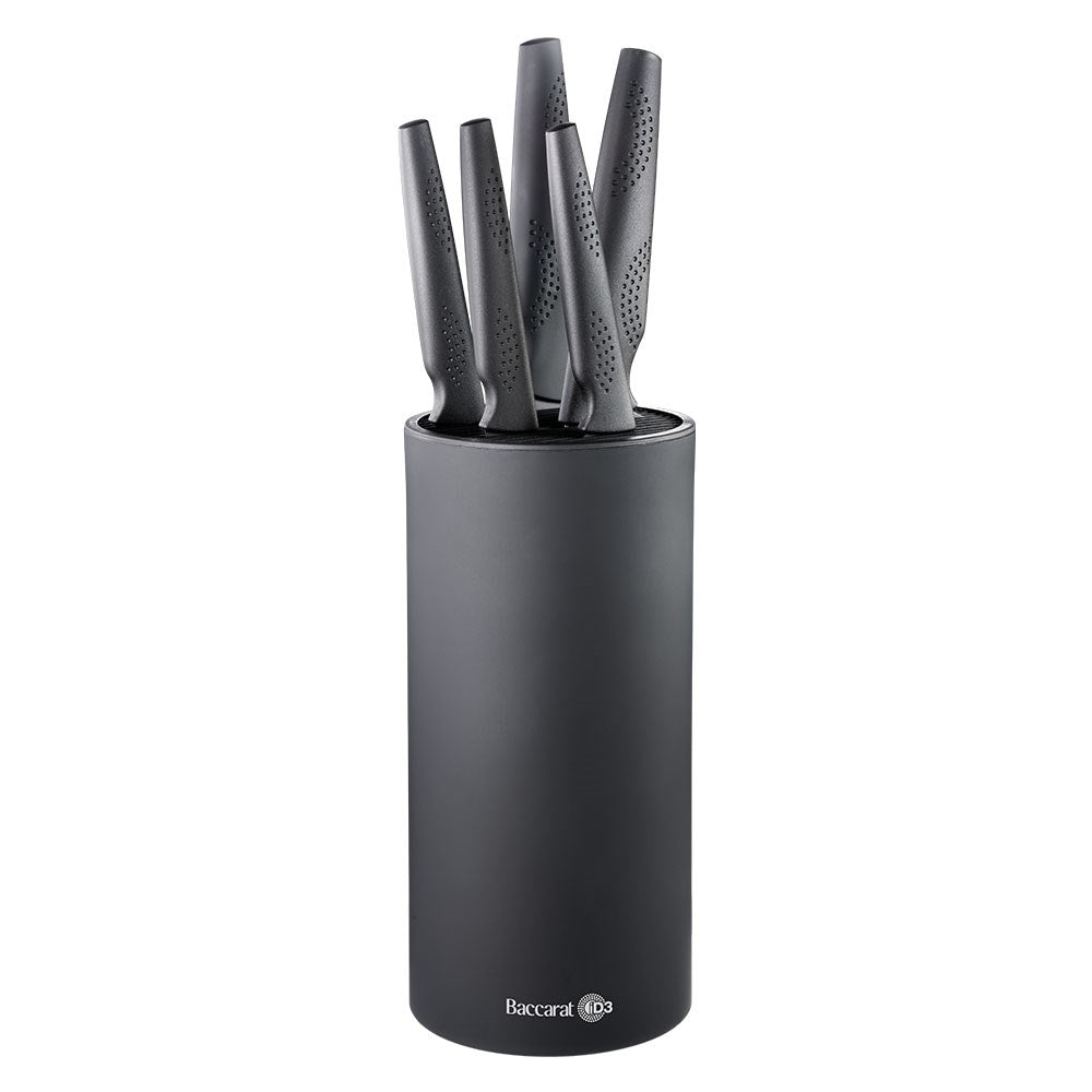 Stylish knife block with six sleek knives and vibrant apples in the background - Baccarat id3 kuro
