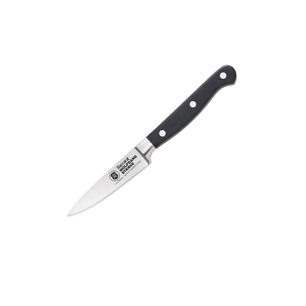 Stainless steel paring knives with a black handle by fresh figs and herbs - Baccarat Wolfgang Starke
