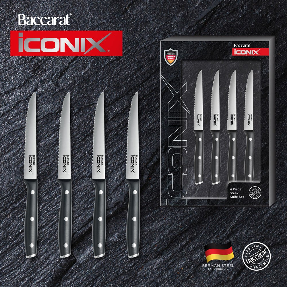 Four stainless steel utility knives aligned horizontally black handles - Baccarat wolfgang starke