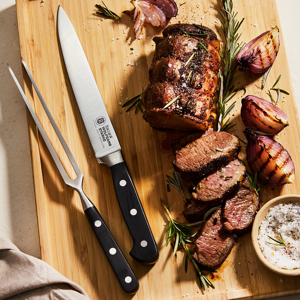 Wooden cutting board with roast beef herbs onions carving knife sharpening steel 20cm - Baccarat