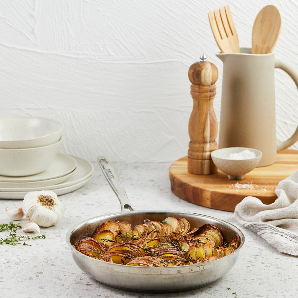 silver cookware set in a box containing pots and pans stainless steel cookware set - Wolfgang Starke