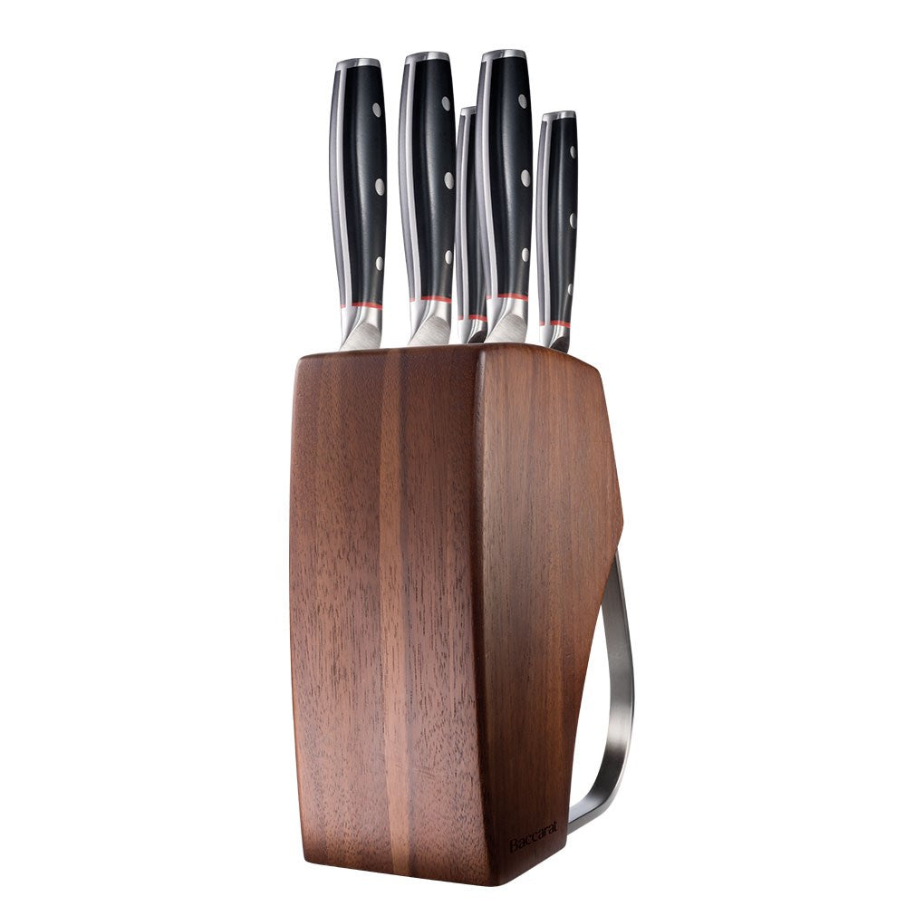 Three stainless steel knives on a dark wood countertop cookware set with egg poacher - Iconix Holz