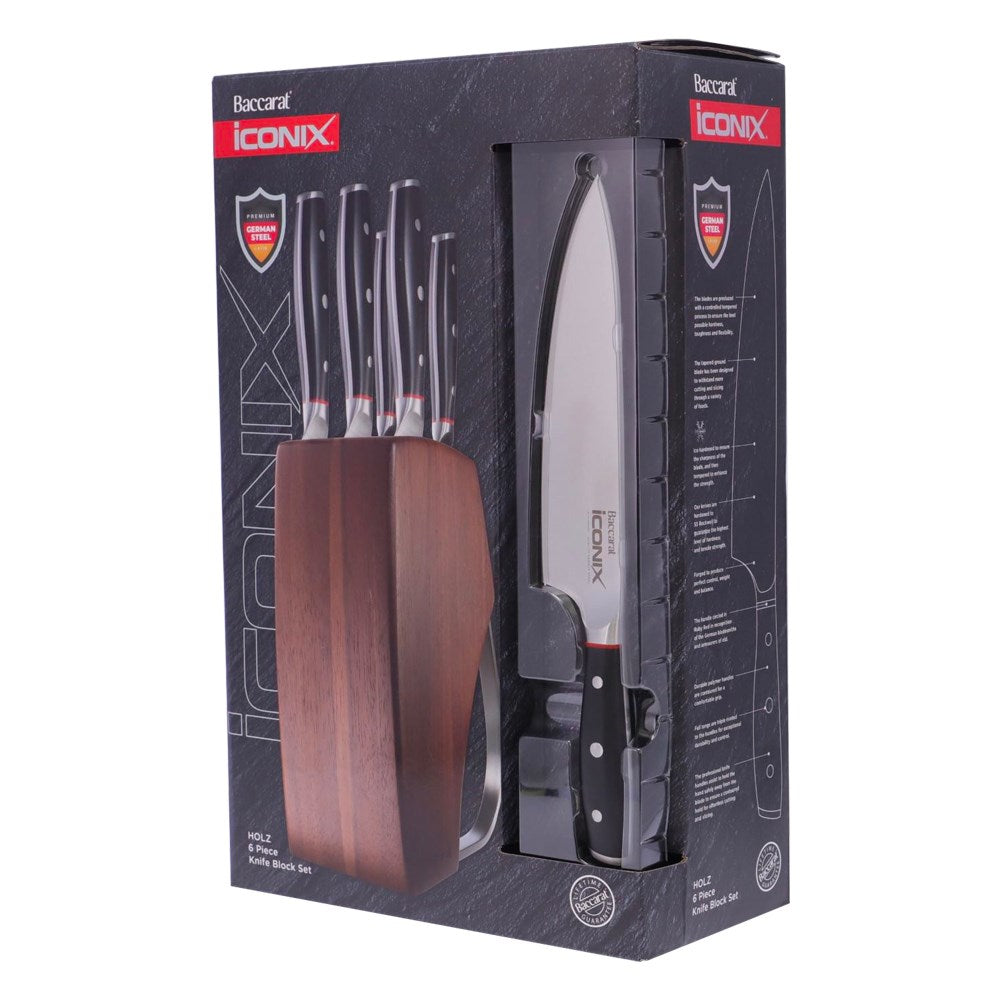 Three stainless steel knives on a dark wood countertop cookware set with egg poacher - Iconix Holz