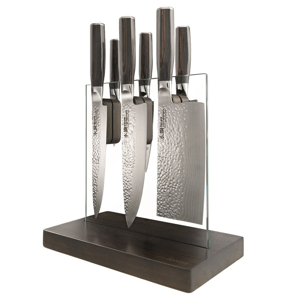 A knife on a wooden board with sleek blades on a countertop - Part of 7-piece knife block - Baccarat
