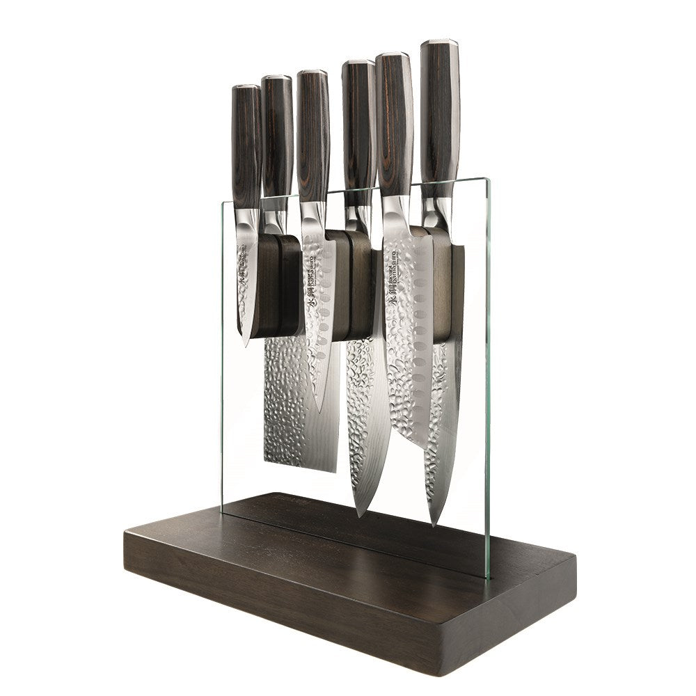A knife on a wooden board with sleek blades on a countertop - Part of 7-piece knife block - Baccarat