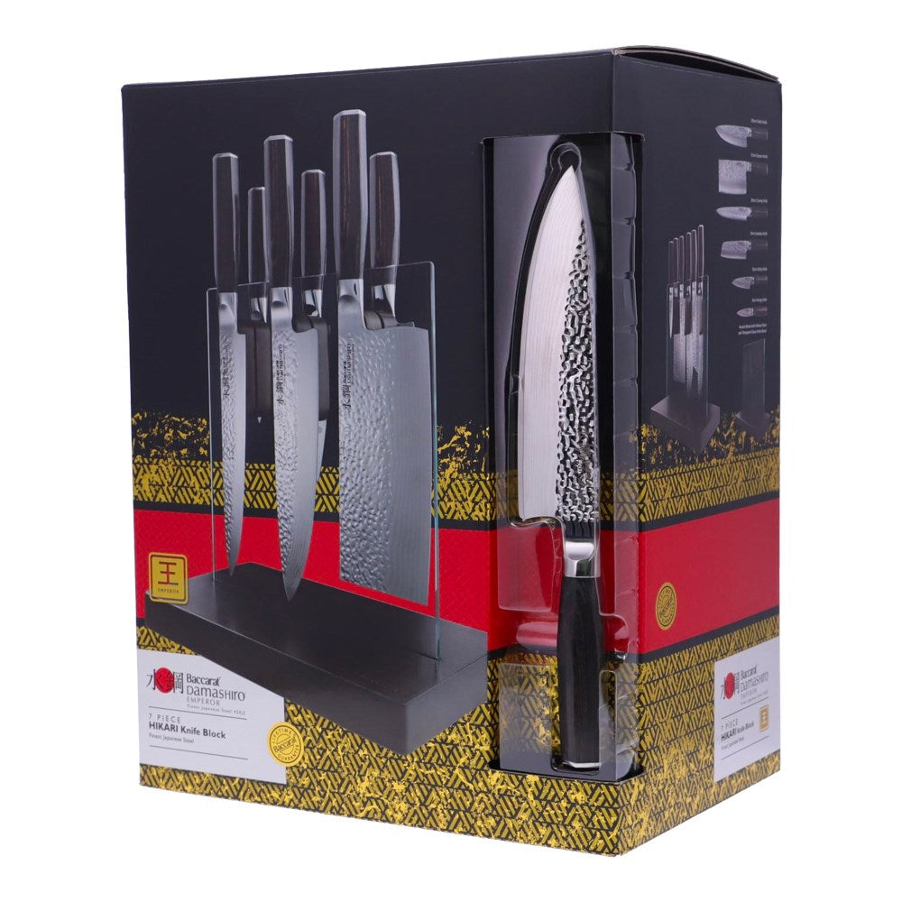 A knife on a wooden board with sleek blades on a countertop - Part of 7-piece knife block - Baccarat