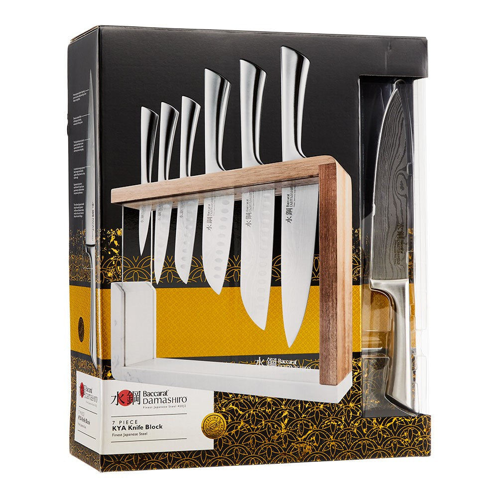 Baccarat Damashiro 7 piece knife block with stainless steel knives on a glossy counter - Baccarat