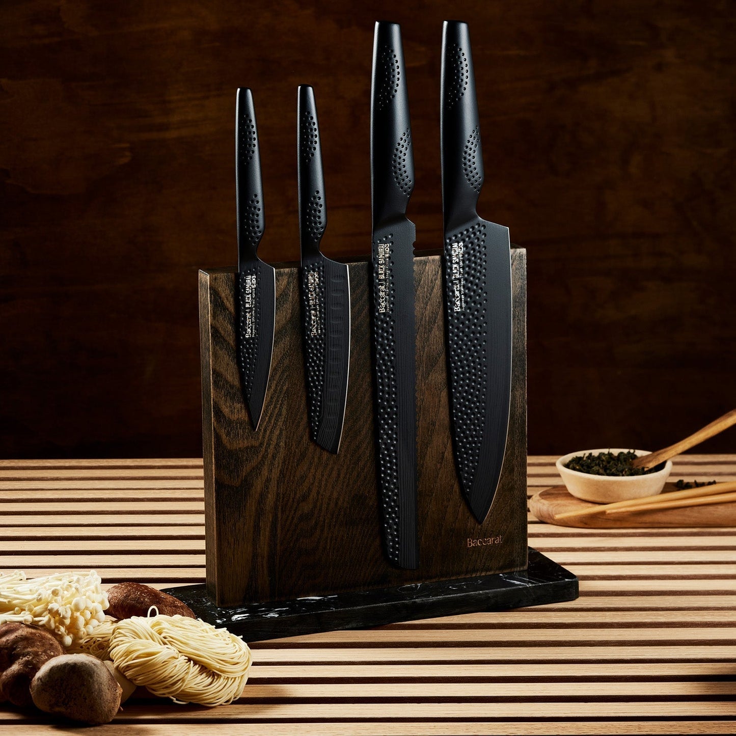 Close-up of two black kitchen knives in a wooden block textured handles colour knives - Baccarat ID3