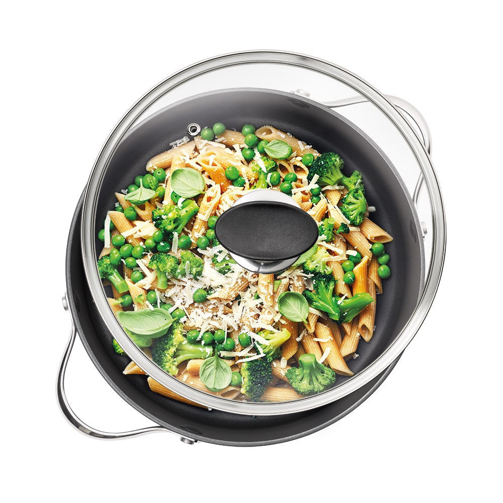 Close-up of a black lid with a sleek handle featuring a polished design - Baccarat Glass Cookware