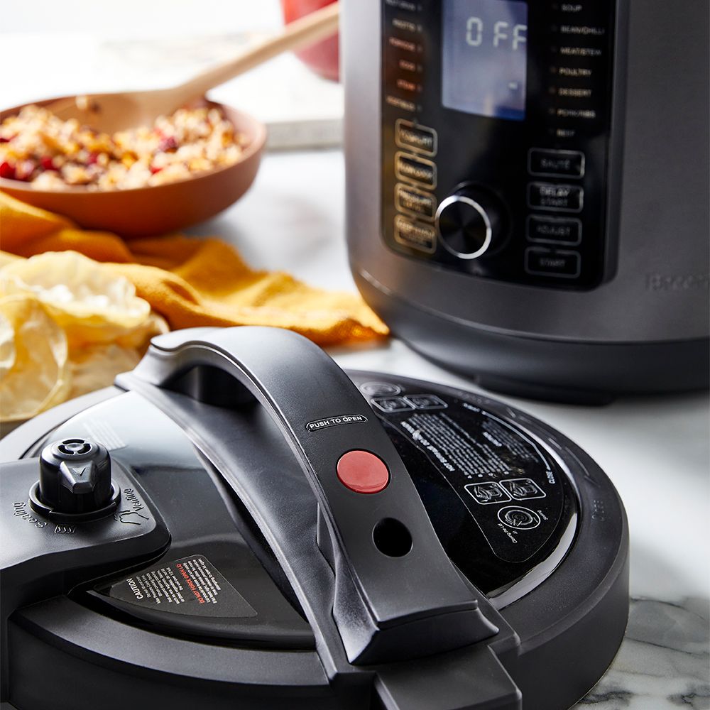Modern kitchen with a bowl of soup and a black and silver electric mill 19cm - Baccarat spice market