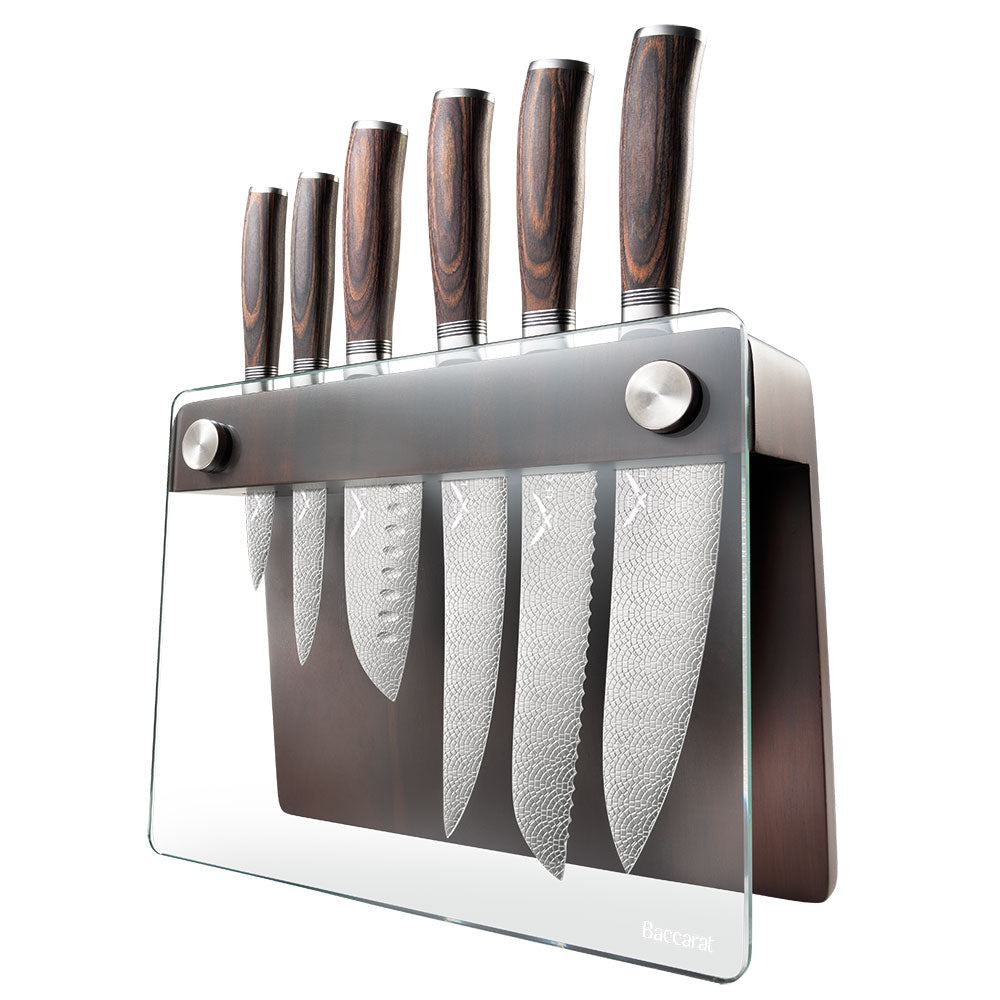 A knife slicing tomatoes on a wooden board silver blade carved handle 8l multicooker black - Epicure