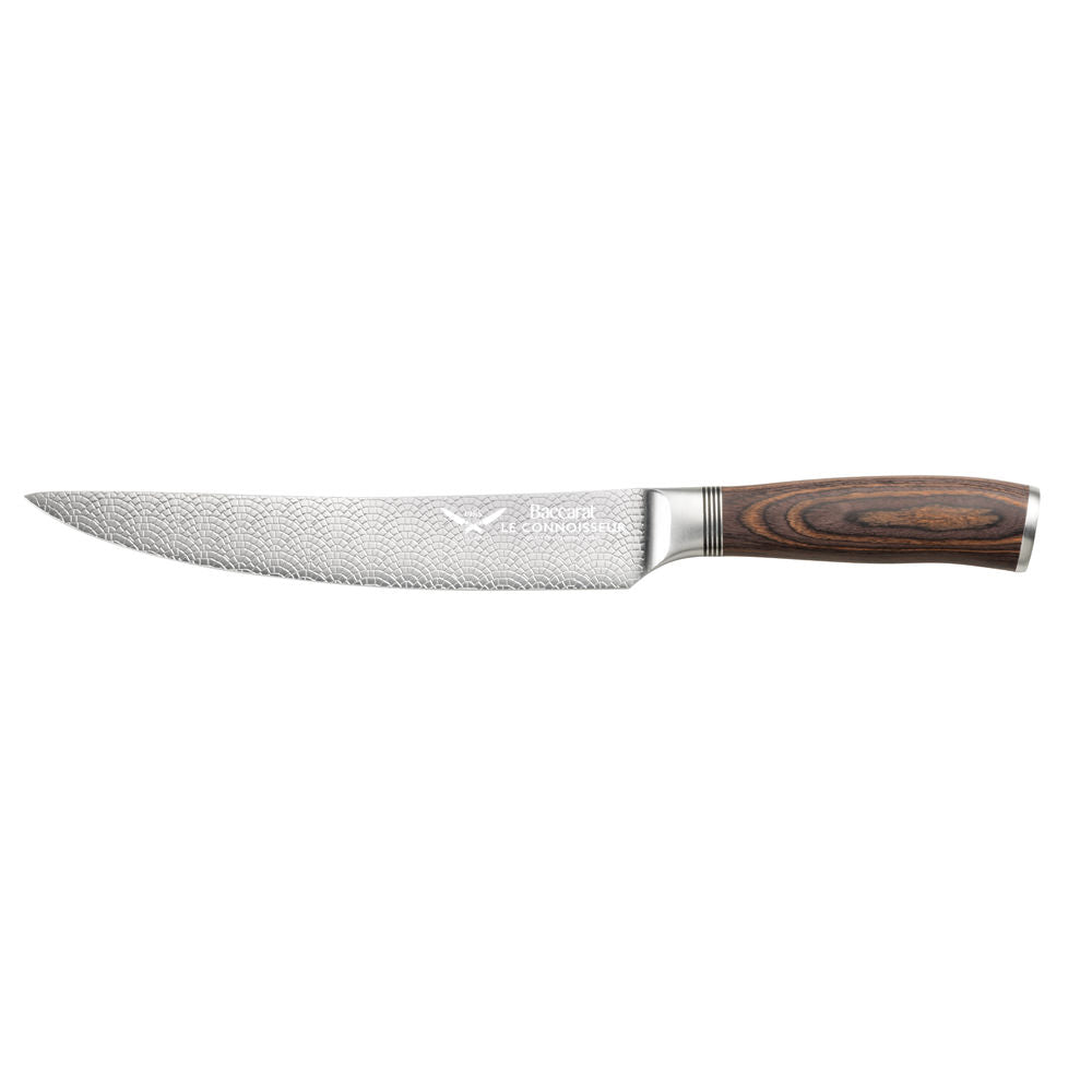 a beautifully crafted carving knife with a sleek wooden handle and fresh sliced tomatoes - Baccarat