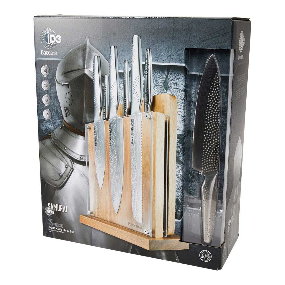 Knife set with silver blades displayed with fruit and nuts on table for precision cutting - Baccarat