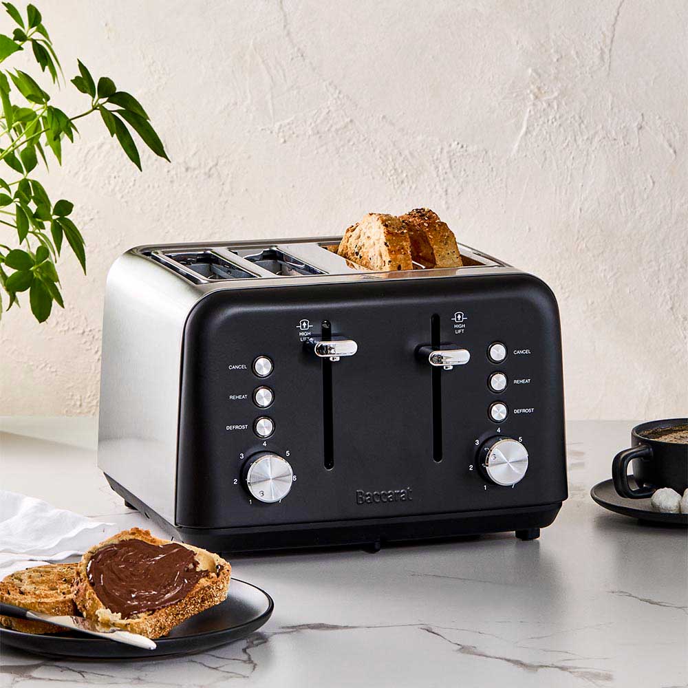 Kitchen counter with toast and a cup black four slice toaster frypan black toast frypan - Baccarat