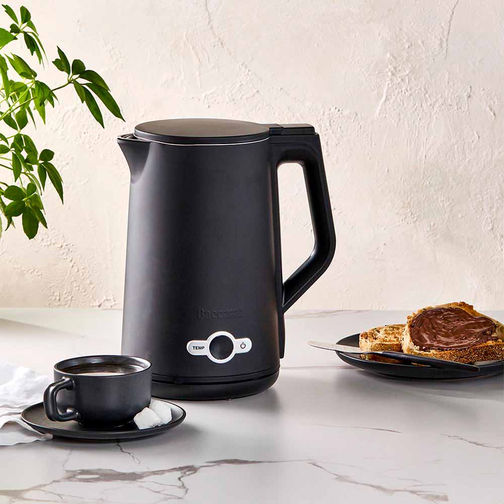 electric kettle on kitchen counter with cup saucer and plate of toast black kettle - Baccarat