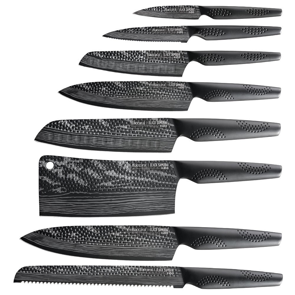 Sharp knives on speckled countertop with sliced tomatoes and onions - Baccarat id3 Black Samurai Syo