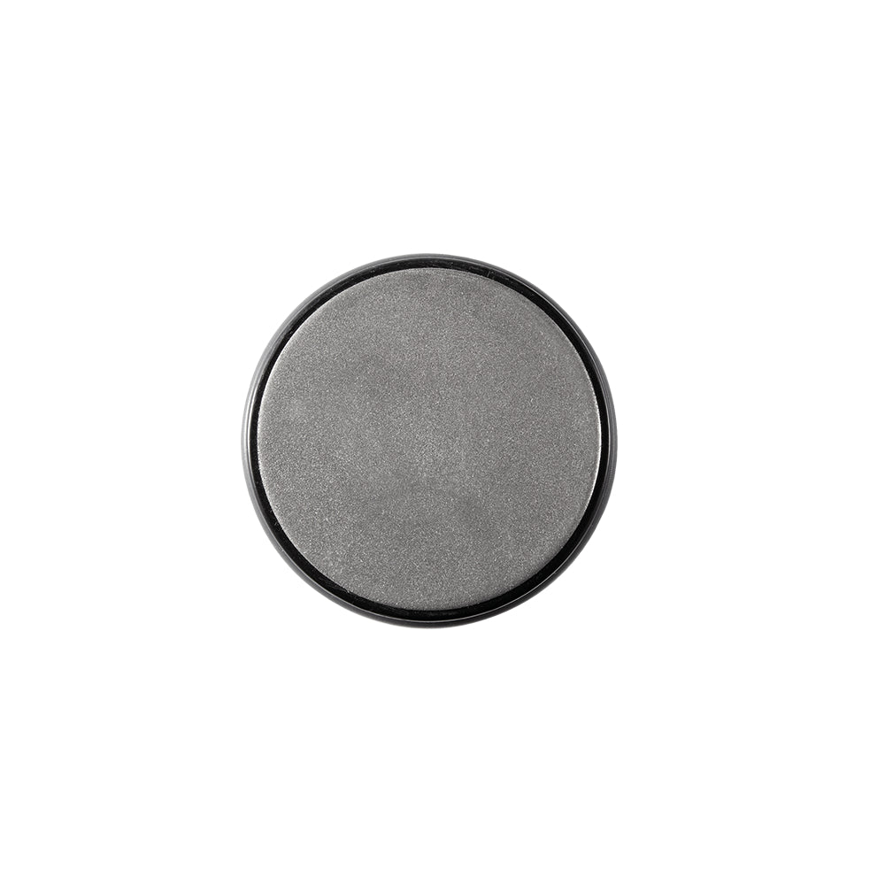 Hand sharpening a large kitchen knife on a gray sharpening stone gray knife sharpener - Baccarat