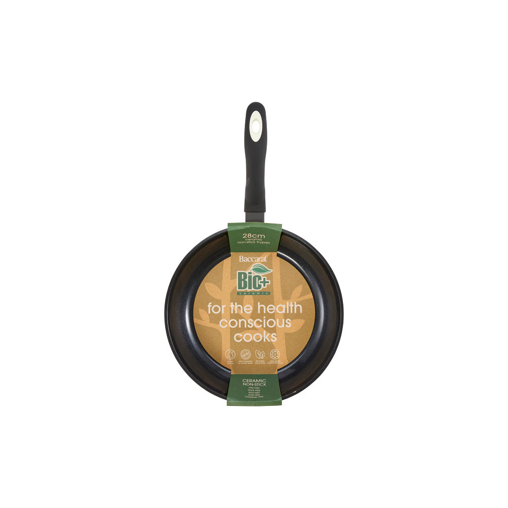 Aerial view of a black non-stick frying pan with a long handle cream non-stick frying pan - Baccarat