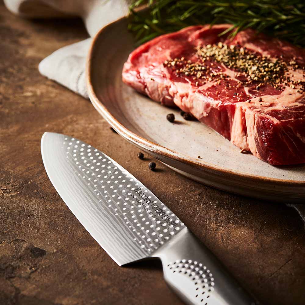 A silver chef's knife with textured blade and sleek handle - Baccarat id3 Samurai Utility Knife 11cm