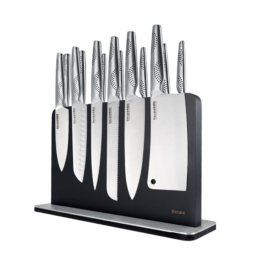 A close-up of a silver stainless steel knife on a wooden cutting board stainless steel knife - Kachi