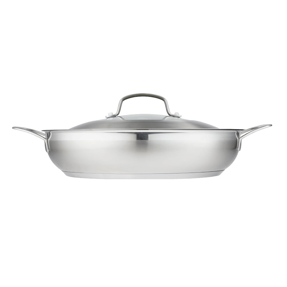 Meal setting with meatball sandwich beer and greens grey cookware 32cm saute pan with lid - Baccarat