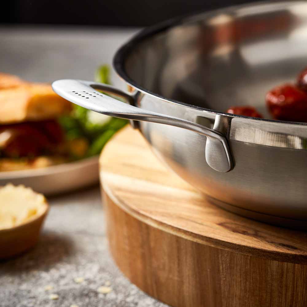 Meal setting with meatball sandwich beer and greens grey cookware 32cm saute pan with lid - Baccarat