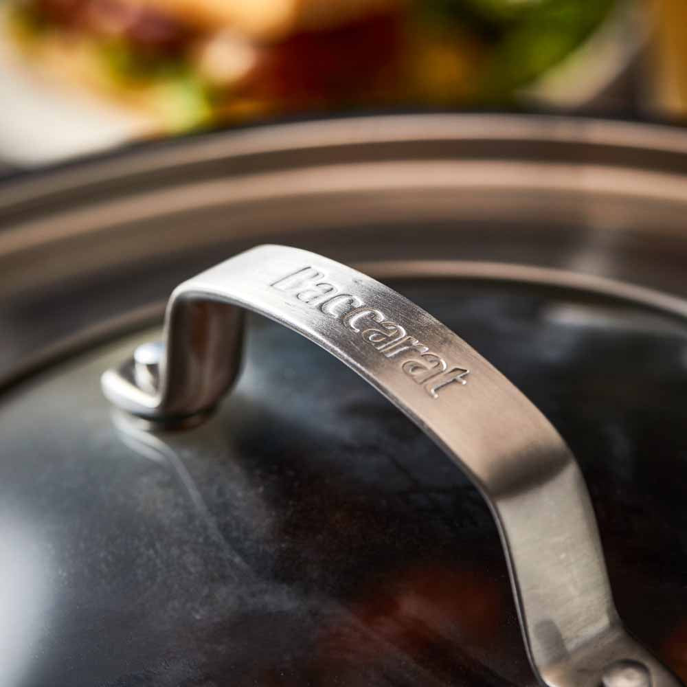 Meal setting with meatball sandwich beer and greens grey cookware 32cm saute pan with lid - Baccarat