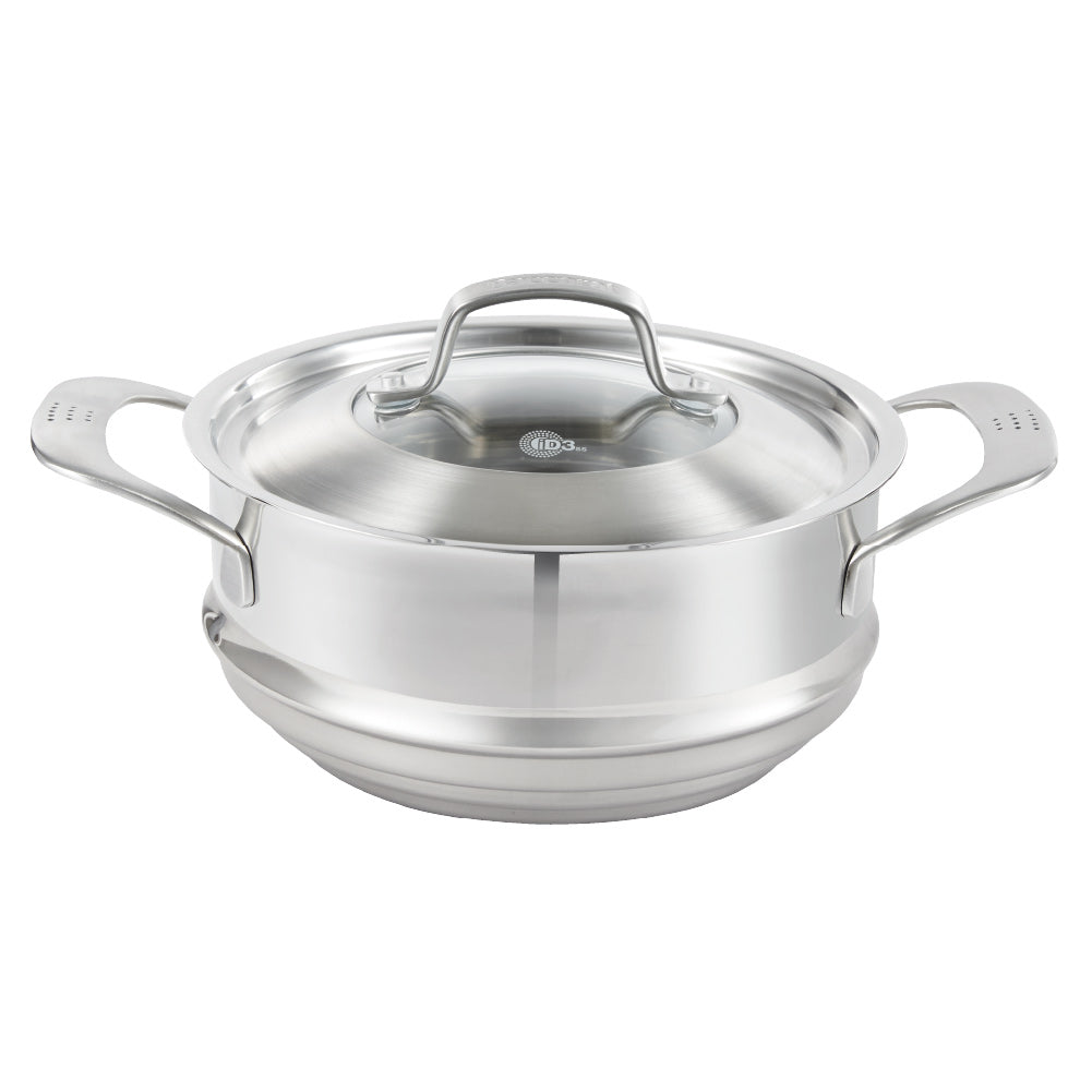 Hand lifting lid off stainless steel steamer with green vegetables on wooden board 32cm - Baccarat