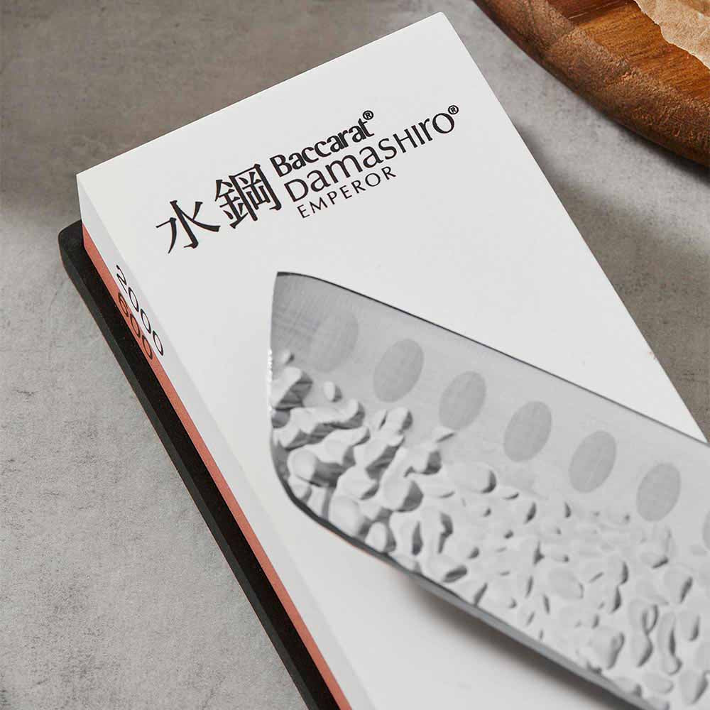 Close up of 600/2000 whetstone and santoku knife - Baccarat