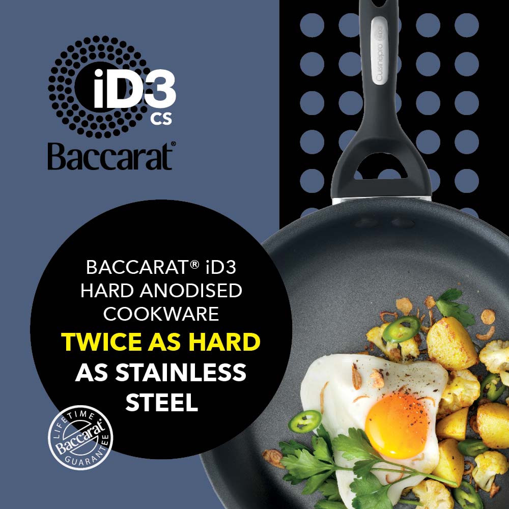A black frying pan with vegetables and a fried egg hard anodised cookware 22cm fry pan - Baccarat