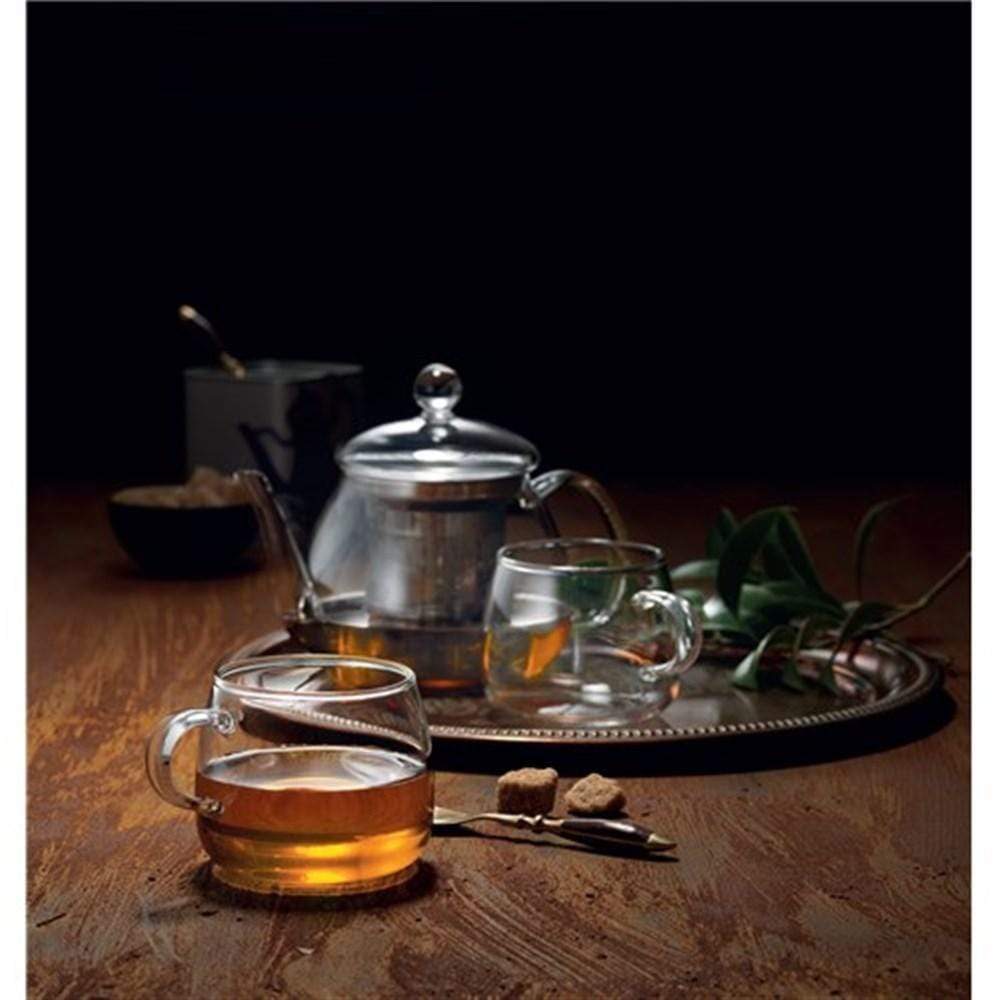 Baccarat glass tea cup and pot set with sugar cubes on a wooden table - Baccarat Barista Venice