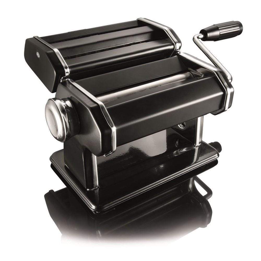 A person creating fresh golden pasta in a cozy kitchen - Baccarat gourmet 150mm pasta machine black