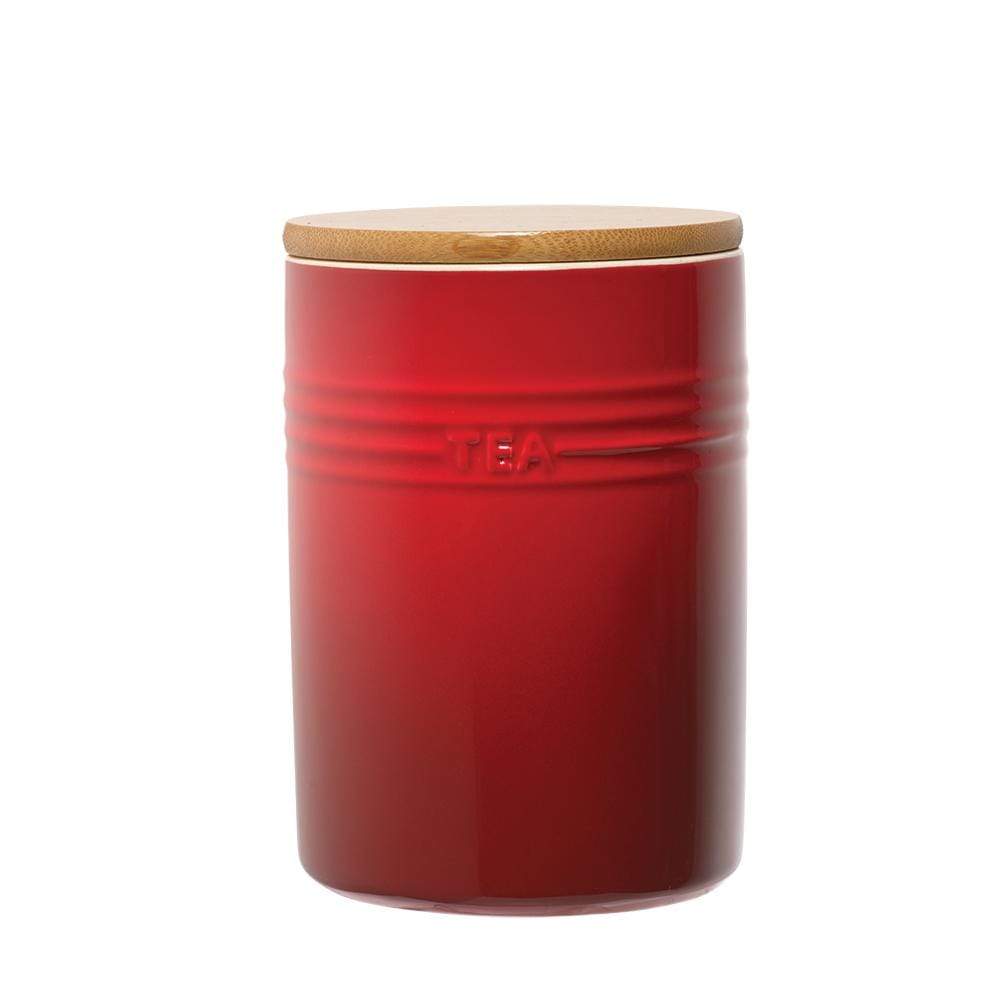 A set of three elegant canisters with a sleek design in rich red - Baccarat
