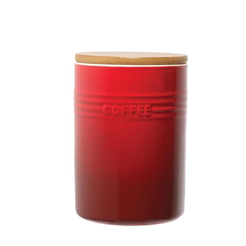 A set of three elegant canisters with a sleek design in rich red - Baccarat
