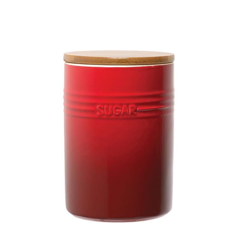 A set of three elegant canisters with a sleek design in rich red - Baccarat