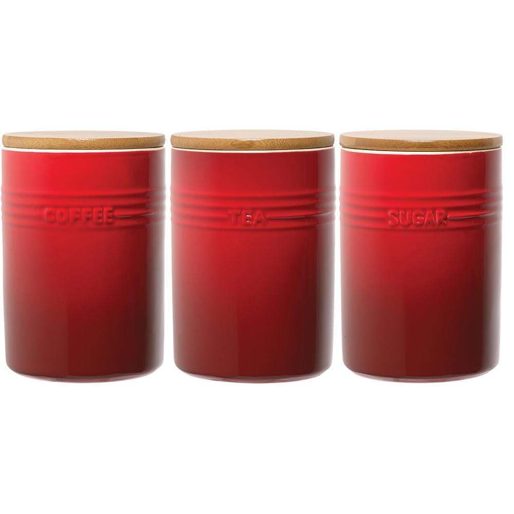 A set of three elegant canisters with a sleek design in rich red - Baccarat