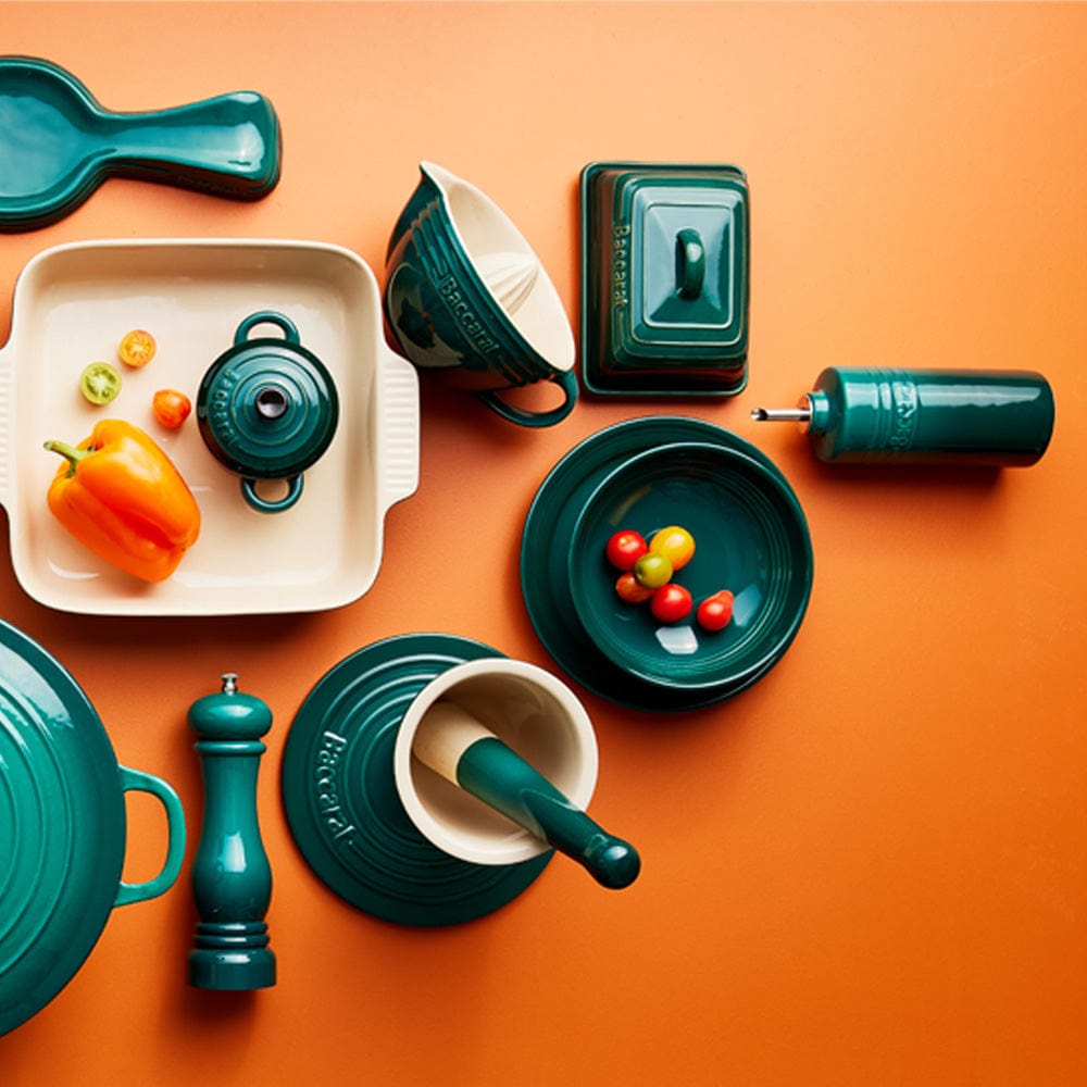 Teal oil bottle elegantly displayed on a vibrant background - Baccarat Le Connoisseur 300ml