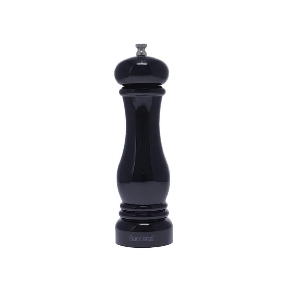 A black cast iron pot on a dark surface with a beige dish and striped towels 300ml red - Baccarat