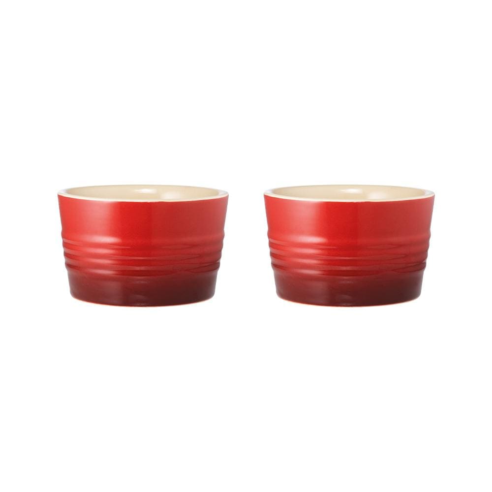 Two 9cm red stoneware ramekins elegantly displayed on a blue background - Baccarat