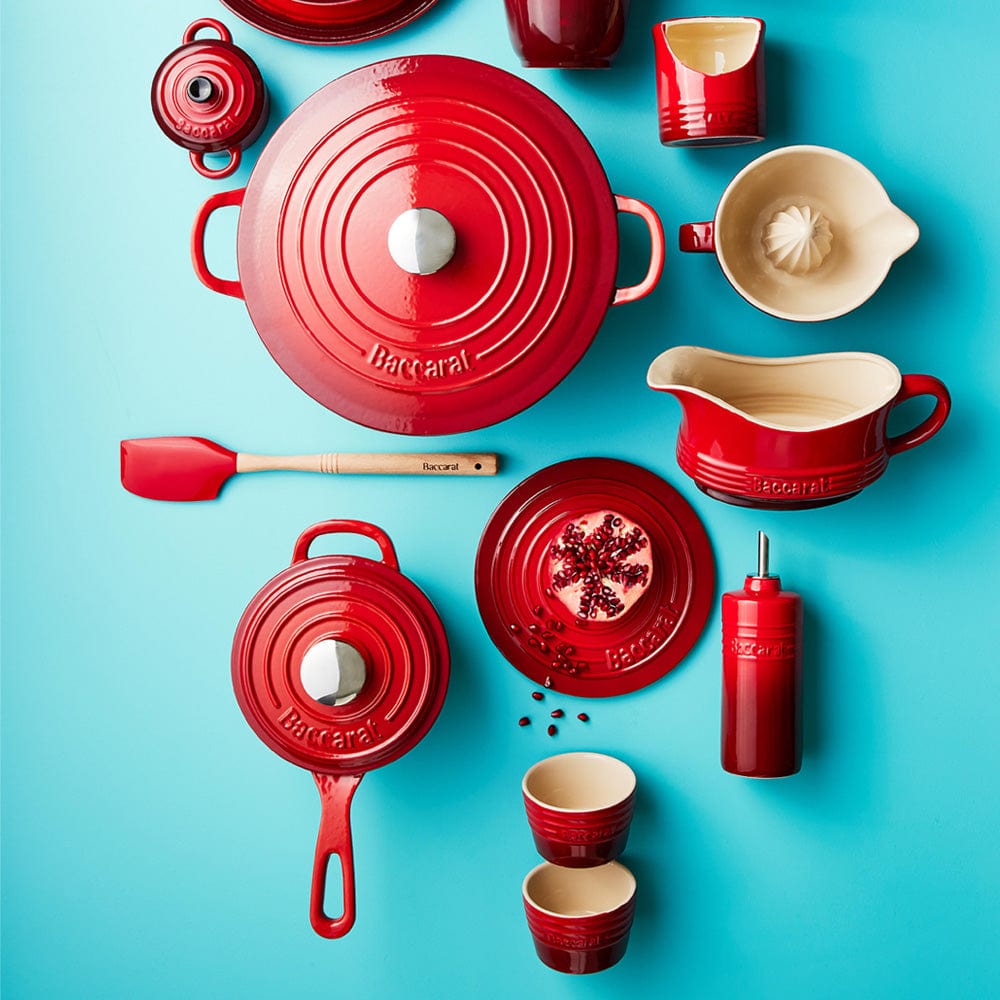 Two 9cm red stoneware ramekins elegantly displayed on a blue background - Baccarat