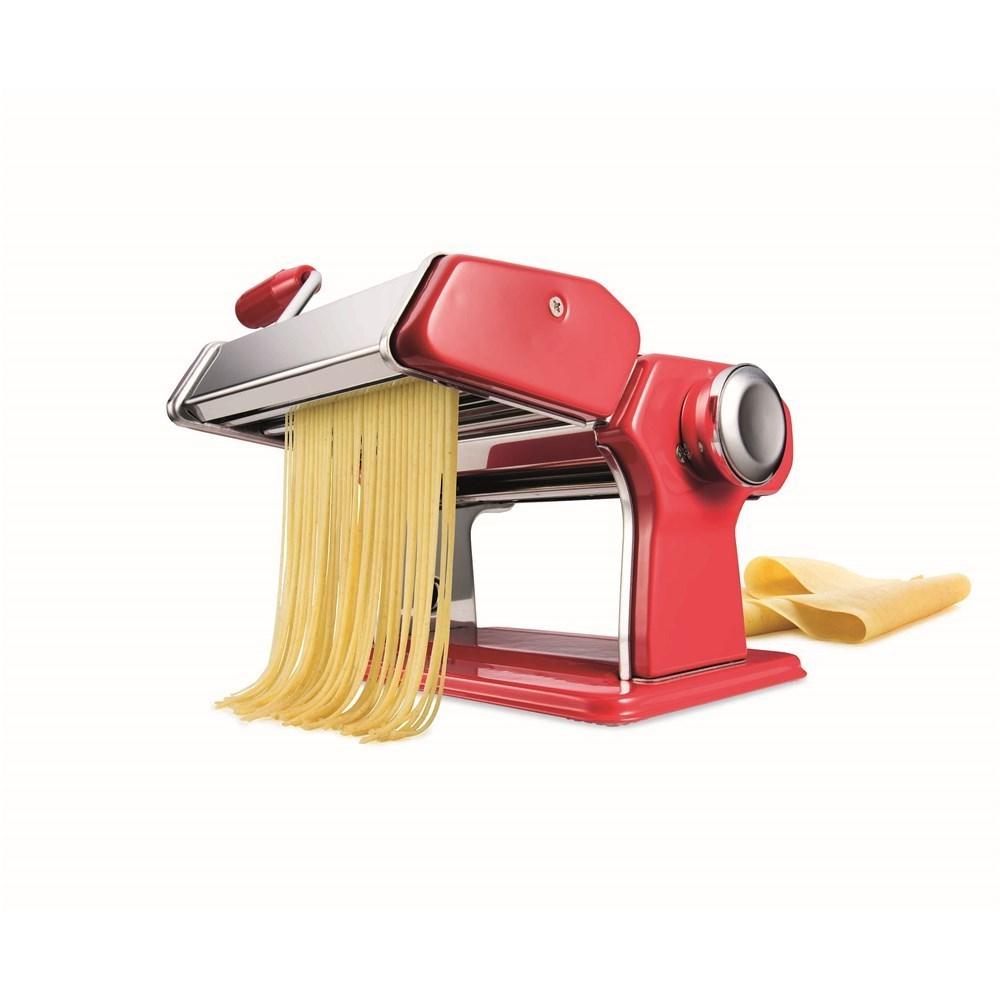 Fresh pasta being produced with surrounding pasta pieces - red Baccarat pasta machine 150mm ii